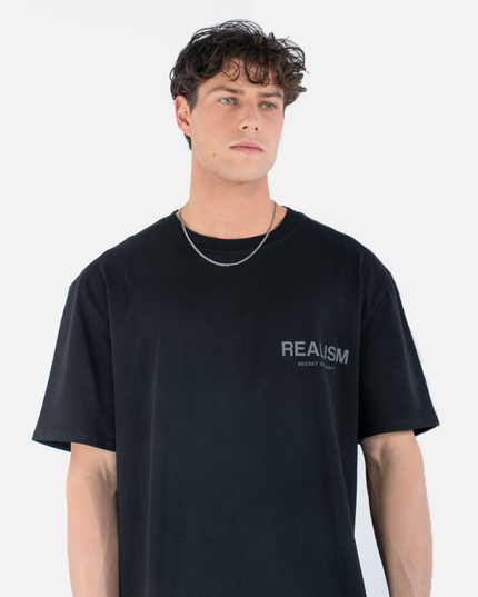 BACK LOGO REFLECTIVE BLACK TEE